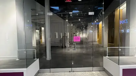 Frosted glass office partition walls with integrated blinds installed by Glass Designer LLC in Naples FL